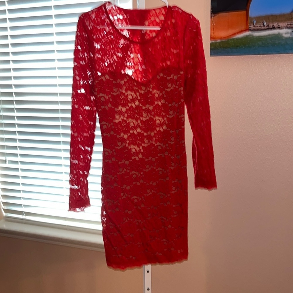 Express size large red dress with open back pit to pit is 21” stretches to 25”
